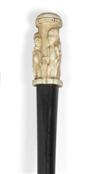 SLAVERY AND ABOLITION Ebony (or lignum vitae) wood cane, 32-1/2 inches long; carved ivory handle 3-1/4x1-1/2 inches, warm patina.